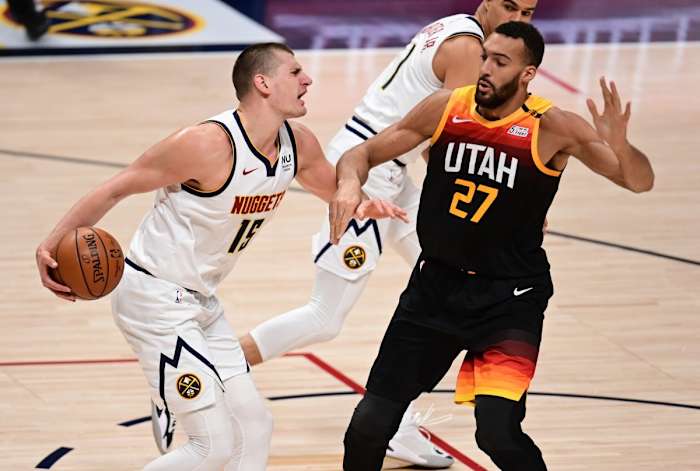 Rudy Gobert (27) defends Nikola Jokic (15) 